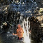 me in the small waterfall, karekare